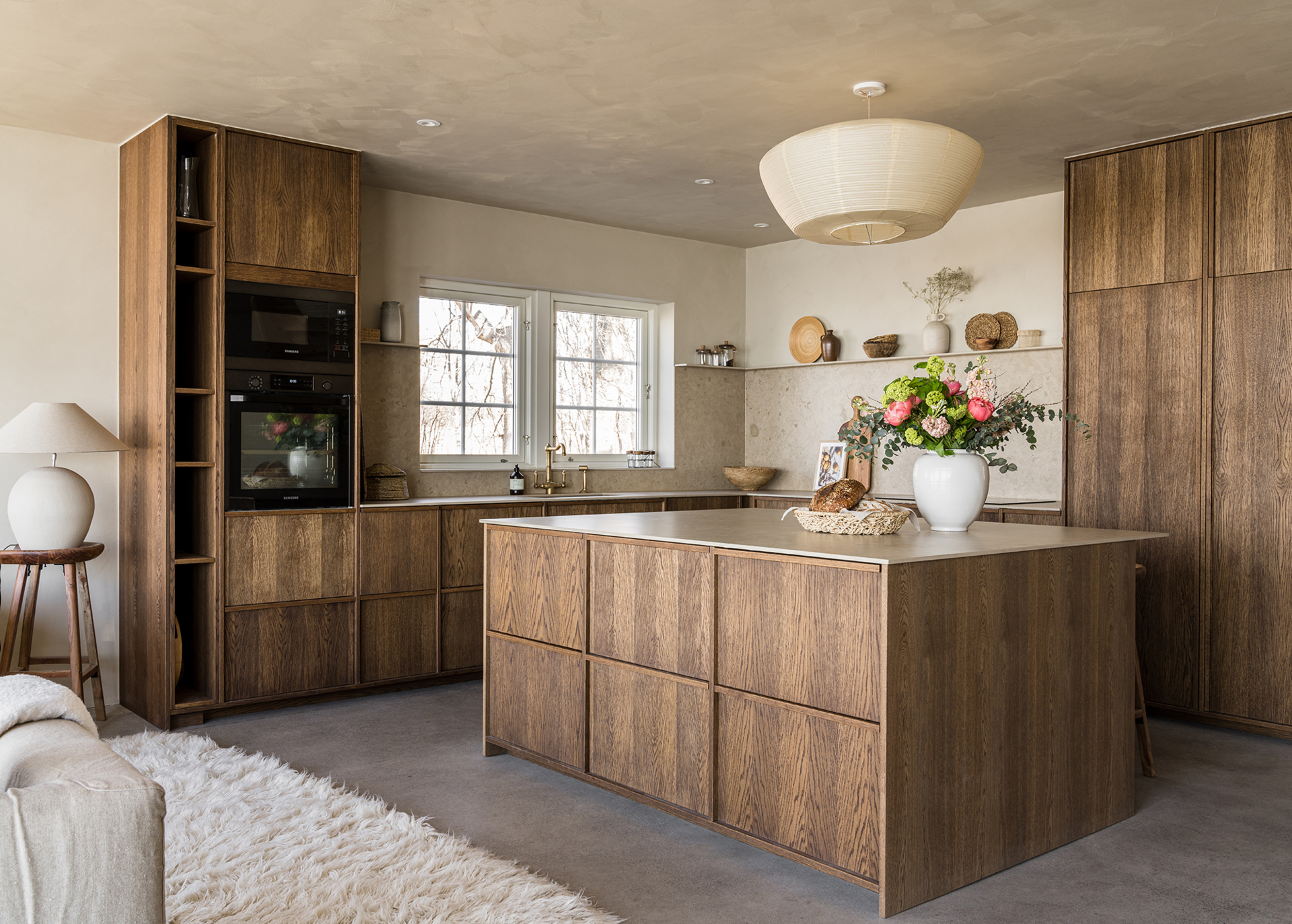 Overall view of wood-heavy kitchen.